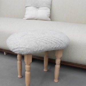 Poefje van trui met kussens